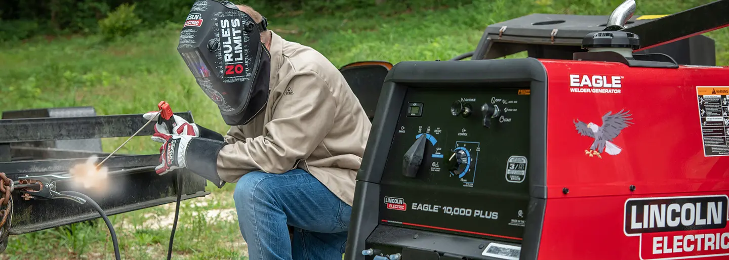 lincoln welder with man stick welding